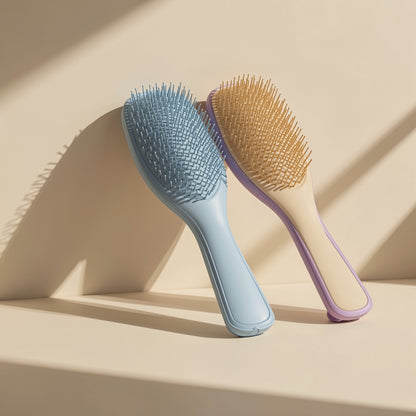 Plastic hair styling brush with multiple teeth and a straight handle