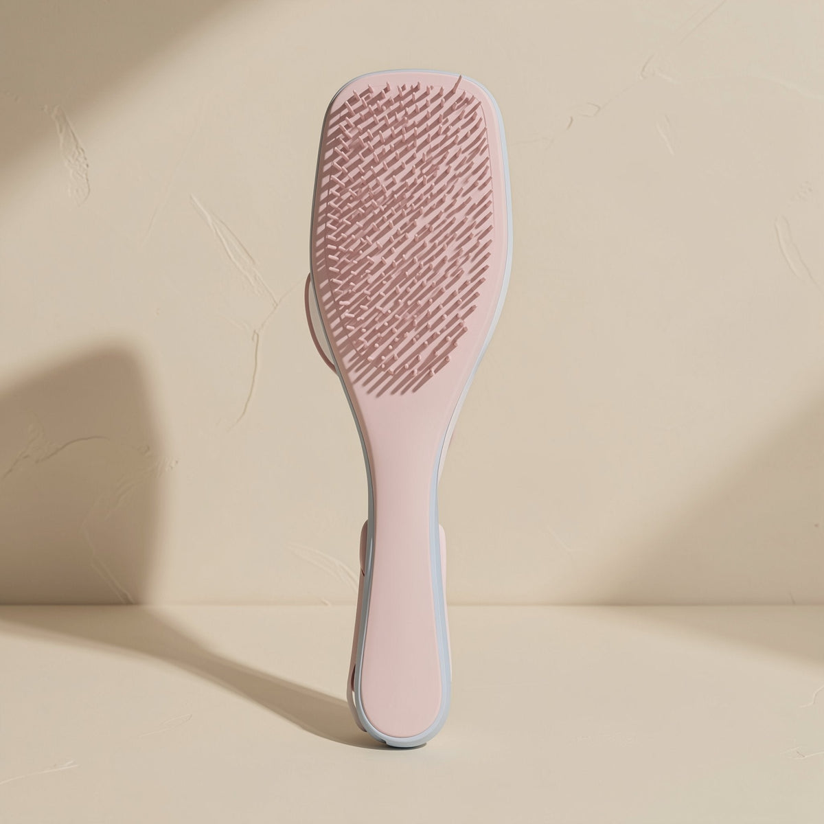 Plastic hair styling brush with multiple teeth and a straight handle - view 3