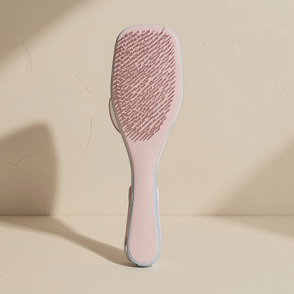 Plastic hair styling brush with multiple teeth and a straight handle - view 3