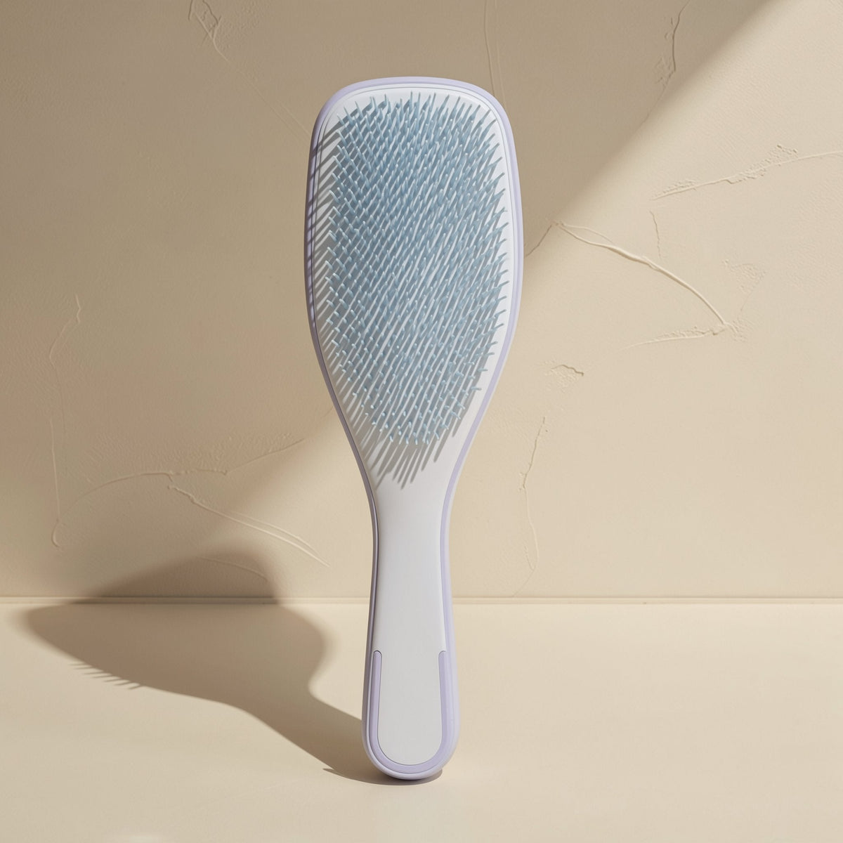 Plastic hair styling brush with multiple teeth and a straight handle - view 5